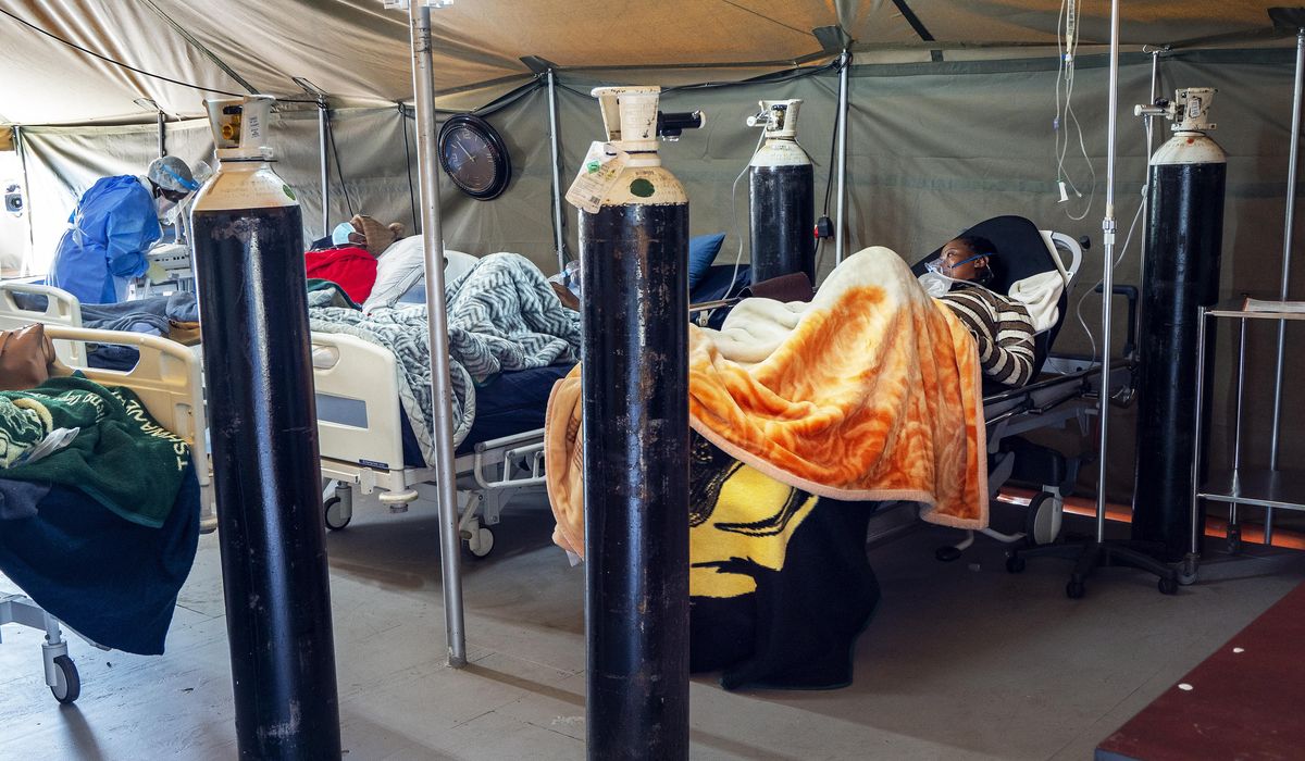 Oxygen already runs low as COVID-19 surges in South
Africa 1