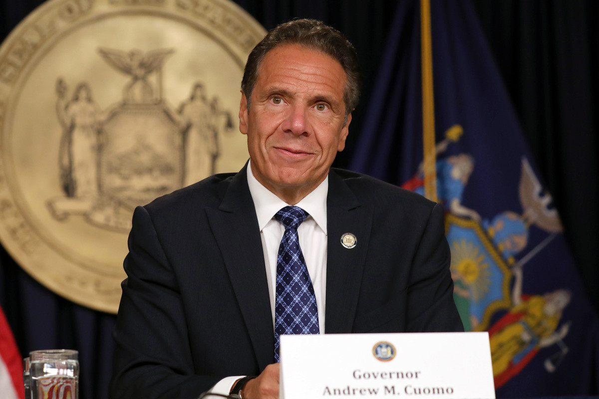 Gov. Cuomo signs coronavirus poster for reporter during
press briefing 1