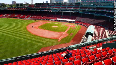 Baseball's Opening Day reflects a politicized nation caught
between Covid-19 and hope 1