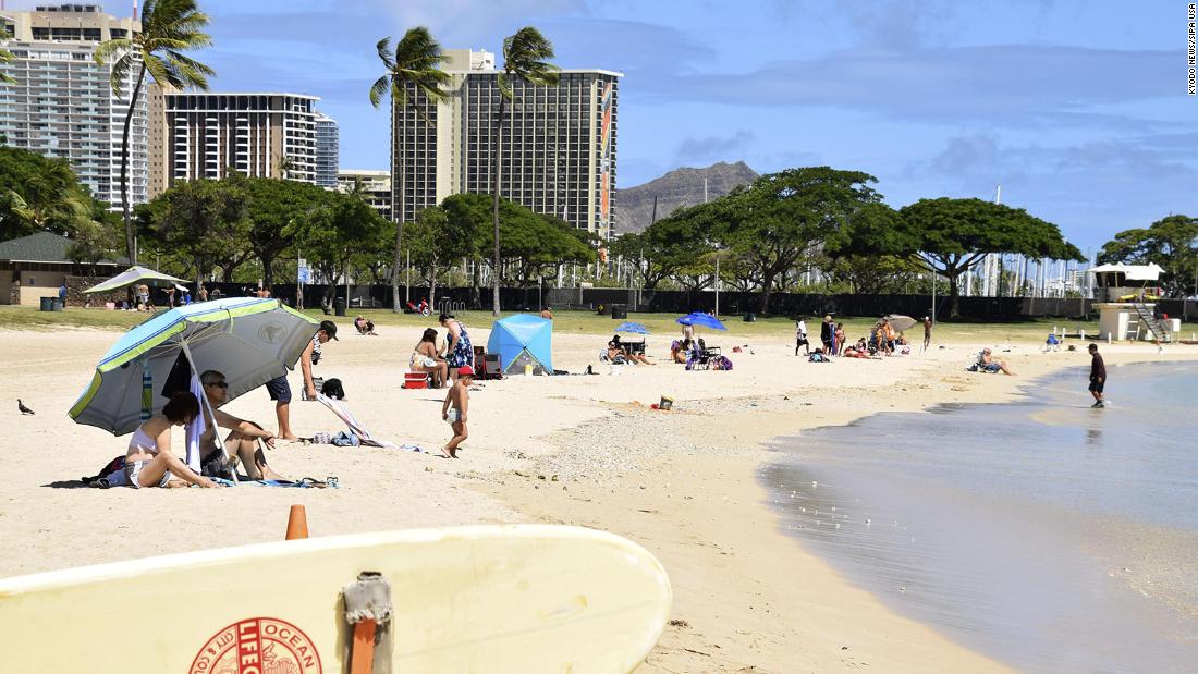 Hawaii reinstates inter-island travel quarantine as Covid-19
cases surge 1