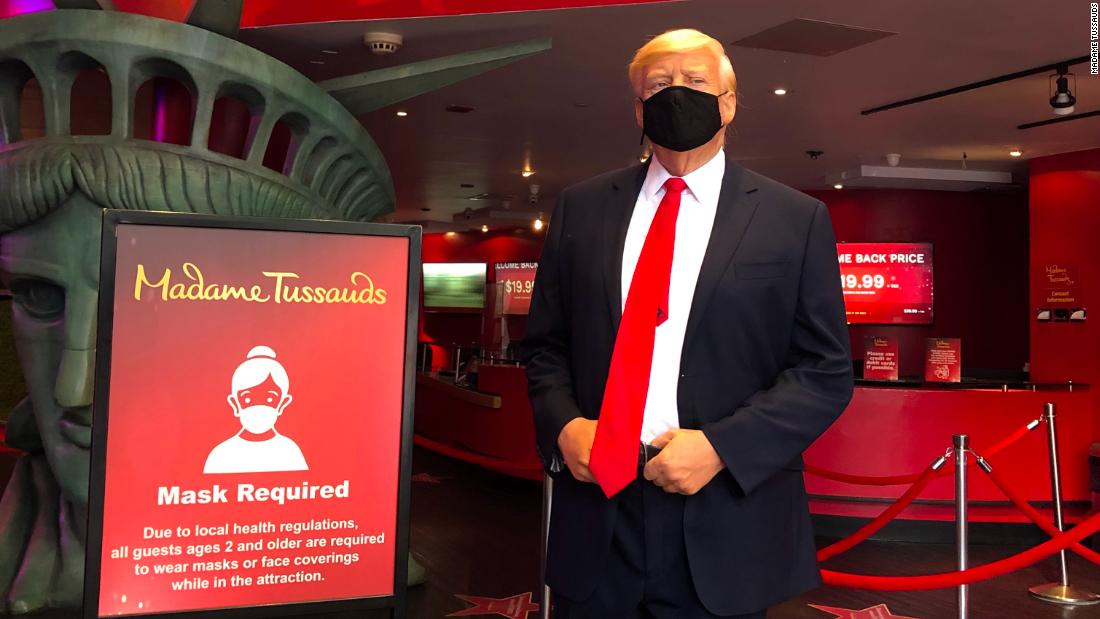 President Trump's Madame Tussauds statue will now greet New
York visitors in a mask 1