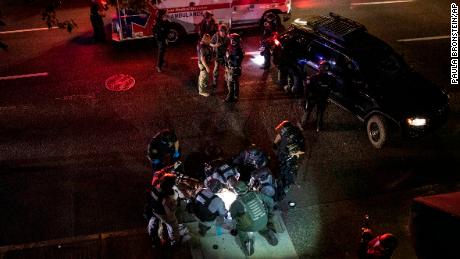 Authorities crack down on Portland protests after
violence 1