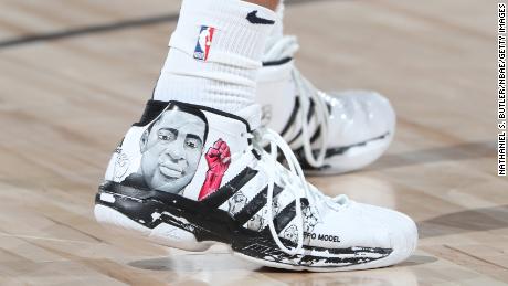 Nuggets star says shoes with images of Breonna Taylor and
George Floyd 'give me life' after scoring 50 points 1