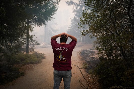In CA: Uber and Lyft get a green light, chaos at L.A. Post
Offices, and fires rage on 1