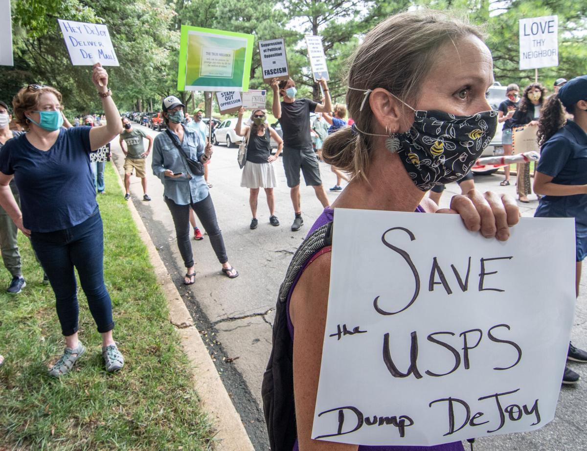Activists Surround Postmaster General's Homes In Weekend
Protests 1