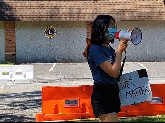 Student who organized Black Lives Matter protest hit with
$2,500 police overtime bill 1