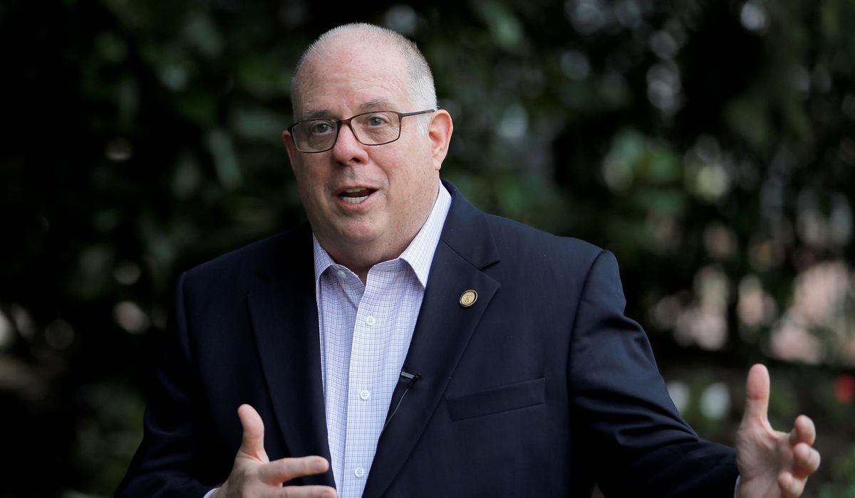 Larry Hogan: Maryland public schools can safely reopen with
COVID-19 cases low 1