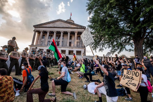 Protesters who camp on Tennessee state property could lose
right to vote under new law 1
