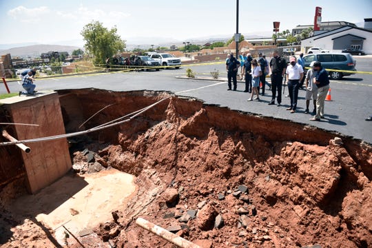 'The power of Mother Nature': Flash flooding in Utah city
opens at least 3 sinkholes, the largest of which swallowed a
vehicle 1 'The power of Mother Nature': Flash flooding in Utah city
opens at least 3 sinkholes, the largest of which swallowed a
vehicle 1
