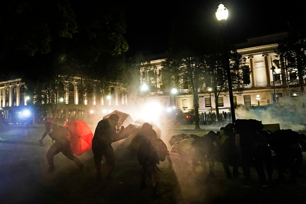 Teen accused of killing 2 thrust into debate over
protests 1