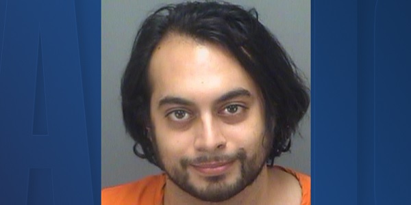 St. Pete protester caught with Molotov cocktail, loaded gun,
police say 1
