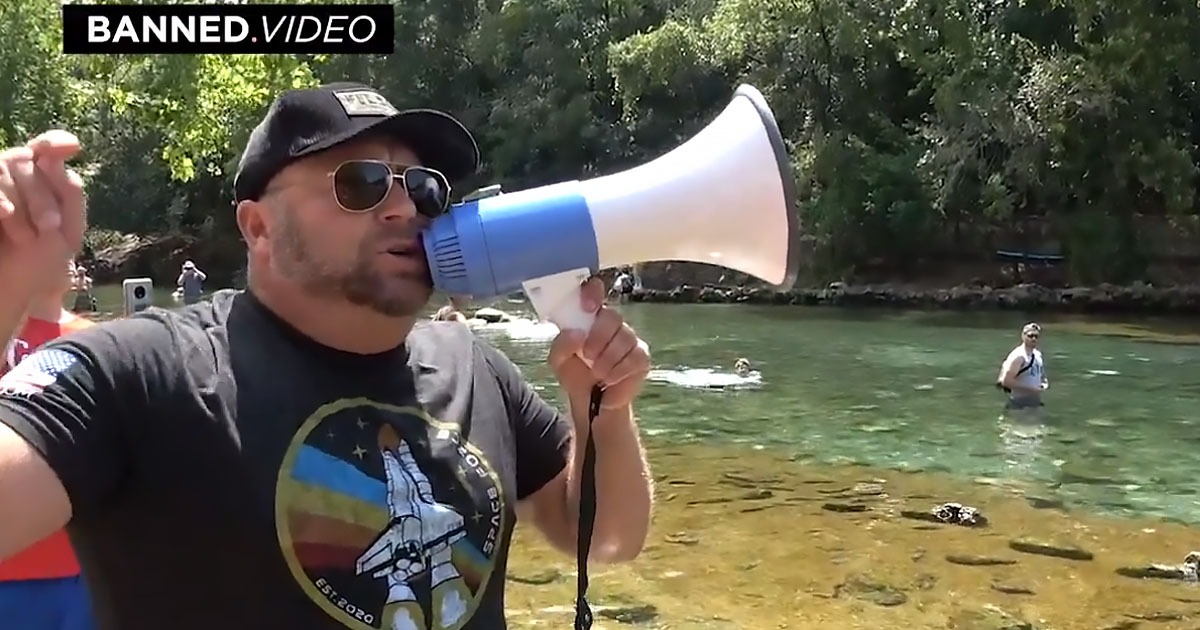 VIDEO: Alex Jones Returns to Austin Greenbelt Closed by
COVID-19 ‘Life Guards,’ Hosts Swimming Party With Beer 1