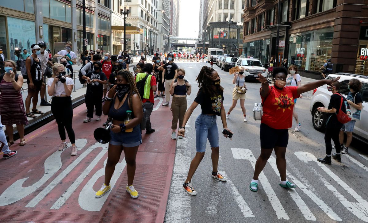 Amid protests, Chicago Board of Ed votes to keep school
police, but also moves to create phase-out plan 1 Amid protests, Chicago Board of Ed votes to keep school
police, but also moves to create phase-out plan 1