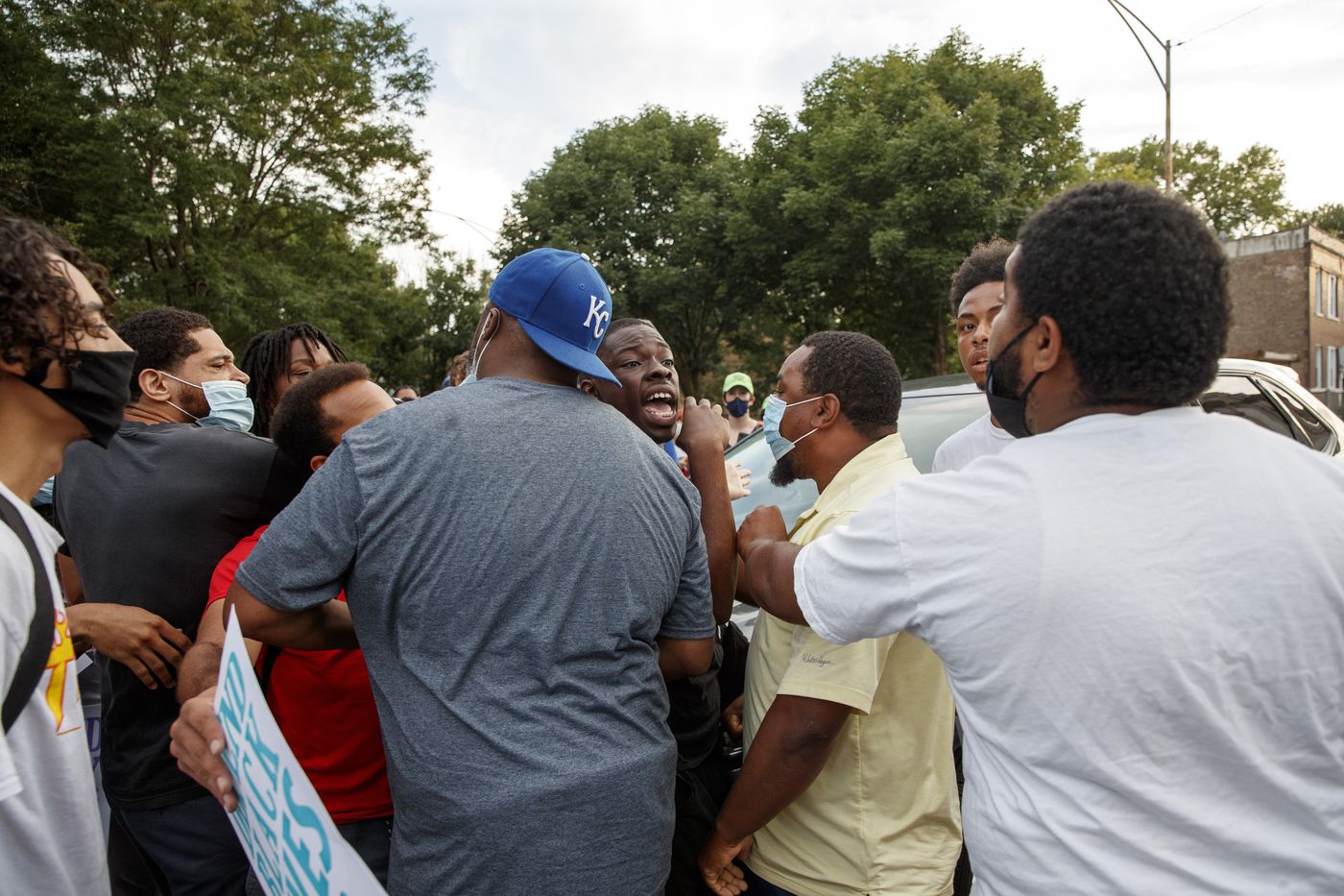 Residents and protesters clash at rally in Englewood 1
