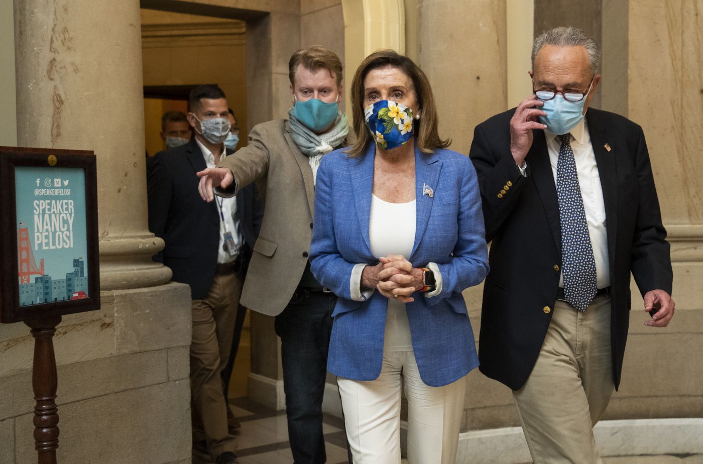 Upbeat Schumer, Pelosi report progress in coronavirus relief
talks 1