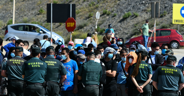 21 Police Injured After 200 Migrants Riot in Spanish
City 1
