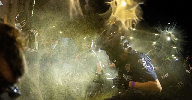 Protesters Pepper Sprayed, Multiple Arrested Prior to RNC in
Charlotte 1