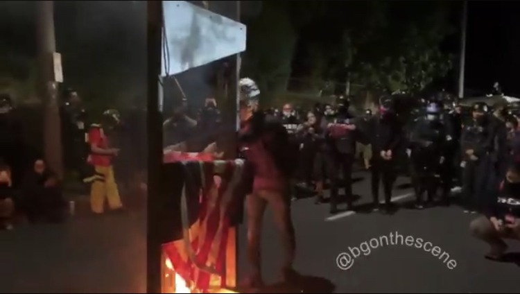 Video: Portland Rioters Roll out Guillotine, “Execute”
American Flags 1