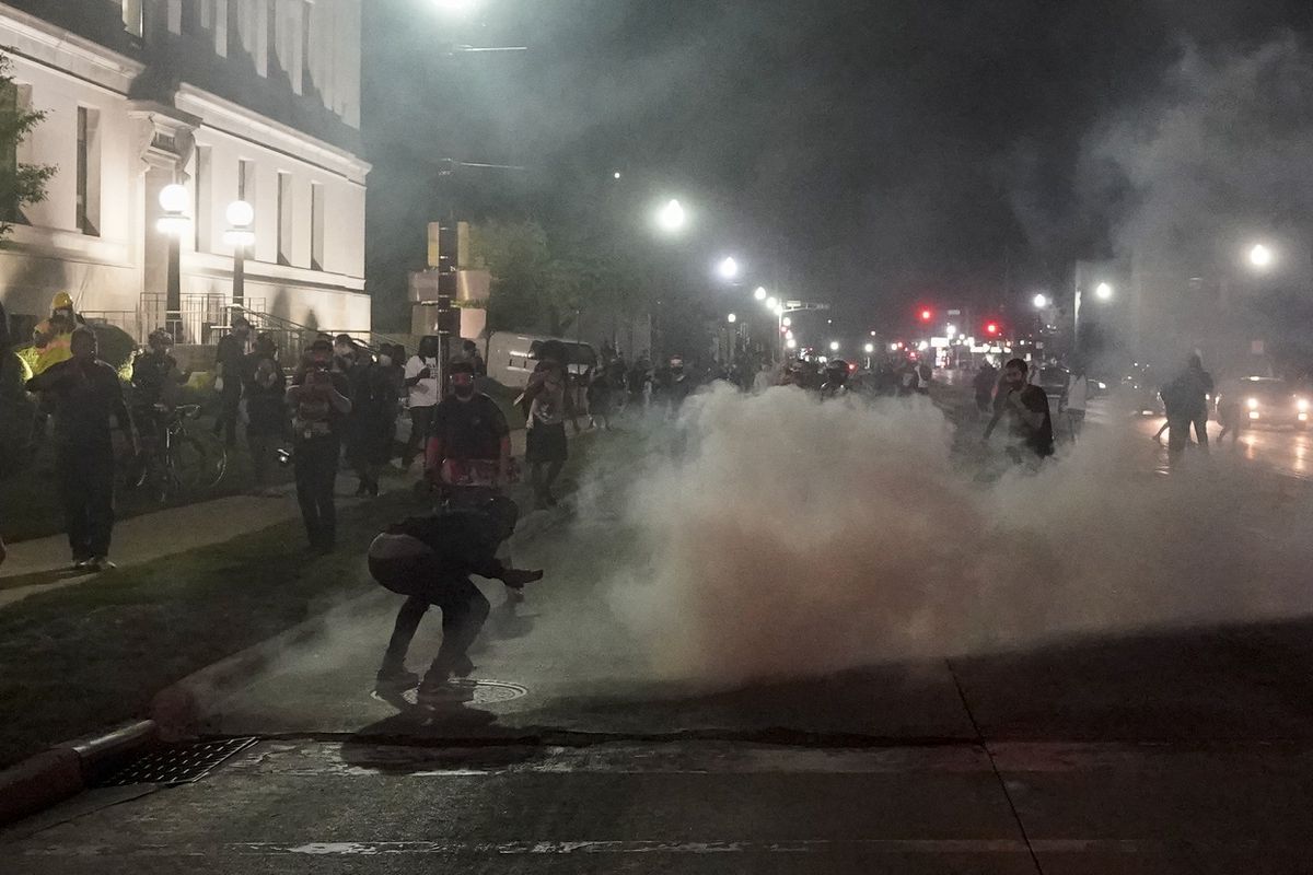 Cops deploy tear gas to disperse curfew-defying protesters
in Kenosha demonstrating against police shooting of Jacob
Blake 1 Cops deploy tear gas to disperse curfew-defying protesters
in Kenosha demonstrating against police shooting of Jacob
Blake 1