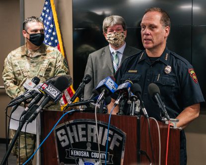 Kenosha police chief blames 2 shooting deaths on protesters
defying curfew 1 Kenosha police chief blames 2 shooting deaths on protesters
defying curfew 1