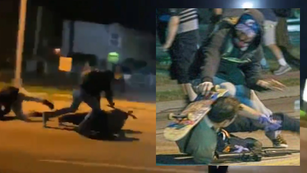 FIGHT for your LIFE: Stunning video shows moment armed
security man had to shoot multiple rioters from the ground or be
beaten to death by Black Lives Matter thugs 1