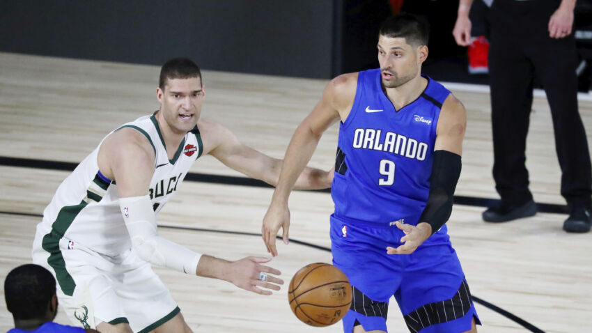 8th-seeded Magic upset top-seeded Bucks in series
opener 1