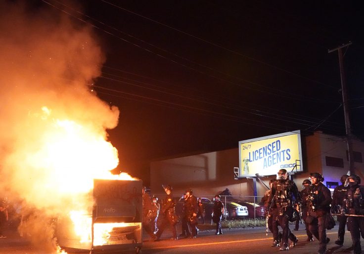 While Portland Police Responded to Riot, More Than 60 Calls
to Dispatchers Left on Hold 1