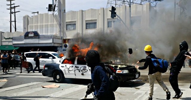 No Mention of Riots at DNC Except as 'Peaceful
Protests' 1