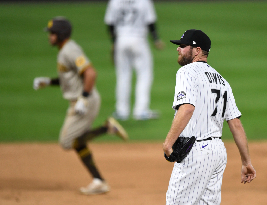 Wade Davis shelled in ninth as Rockies see opening day lead
slip away 1