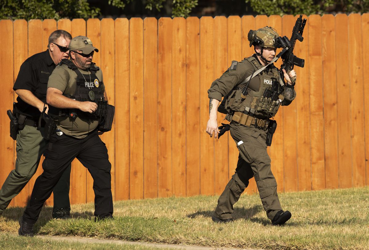 Police identify the 3 officers who were shot while
responding to disturbance at Texas home 1