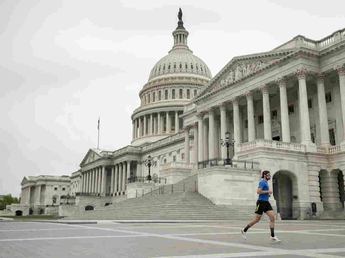 Despite Mask Wars, Americans Support Aggressive Measures To
Stop COVID-19, Poll Finds 1