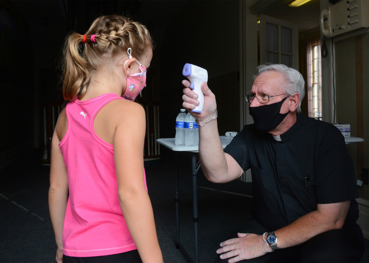 Why we felt called to open our Catholic schools full-time,
in-person amid COVID-19 1