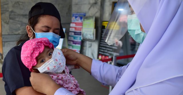W.H.O. Issues Directive for Child Masks, Says Coronavirus
Pandemic Could Last 2 Years 1