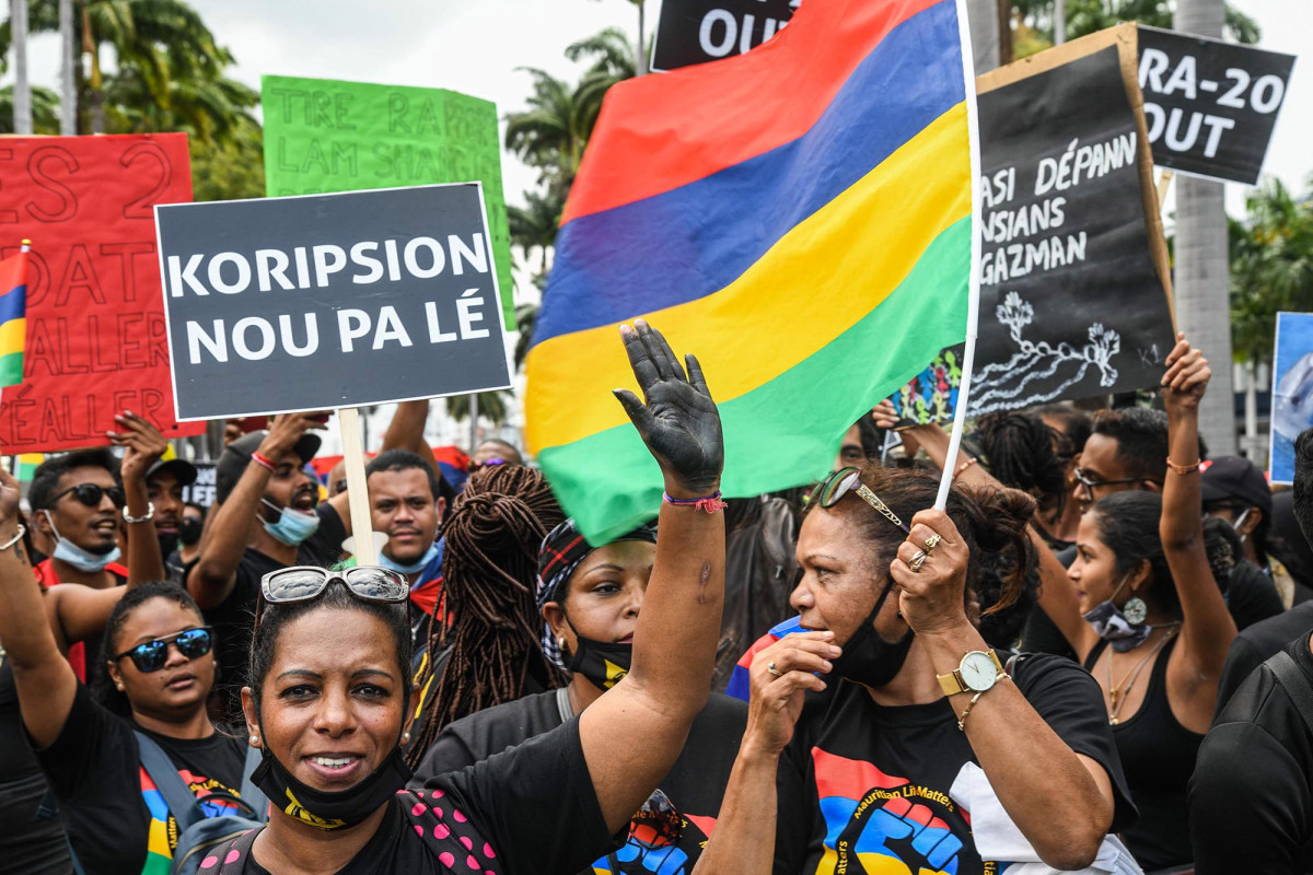 Protests fill Mauritius streets as dolphin death toll climbs
from oil spill 1