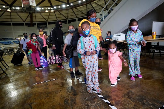 Louisiana governor wary of COVID-19 spike as displaced Laura
victims scatter across state 1 Louisiana governor wary of COVID-19 spike as displaced Laura
victims scatter across state 1