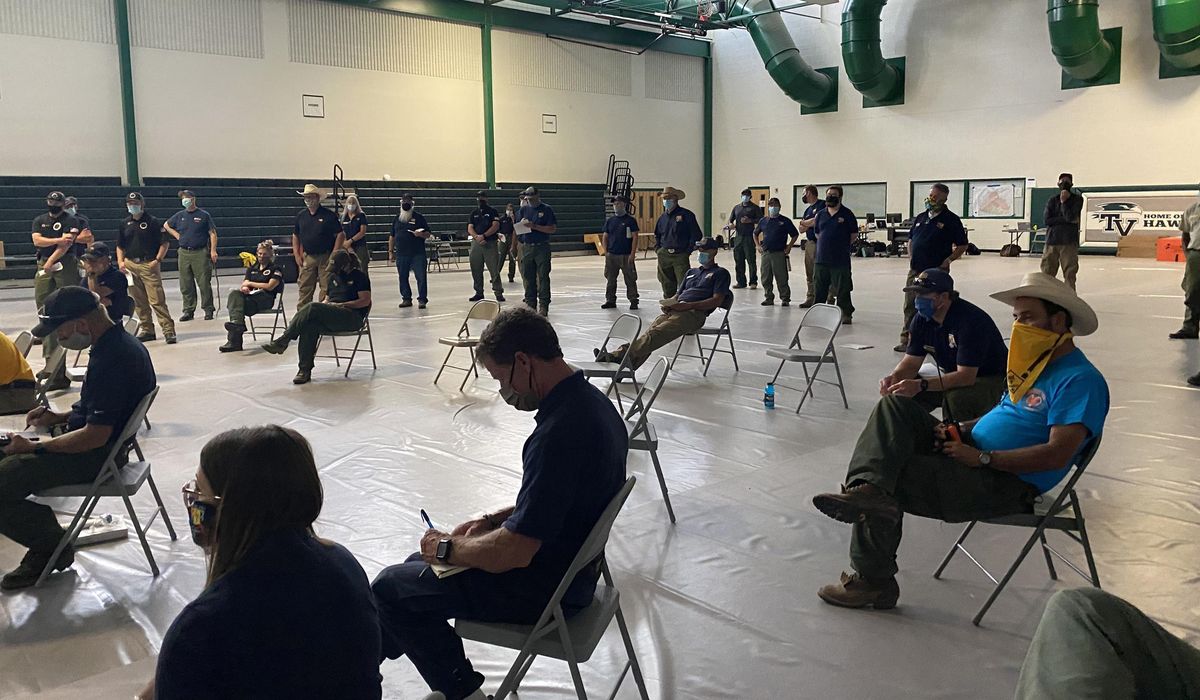 COVID-19 leads to changes in fire camps, community
briefings 1