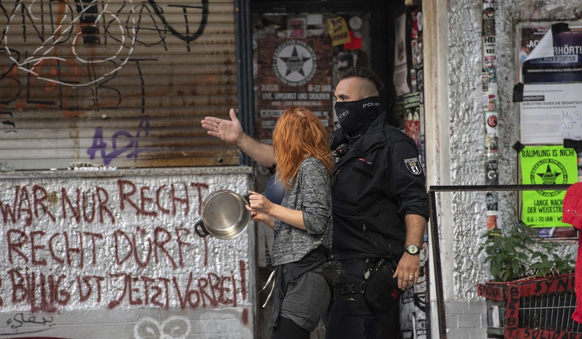Protesters seek to block eviction of left-wing Berlin
bar 1