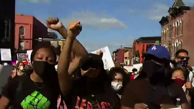 Video shows armed Belarus president amid growing
protests 1