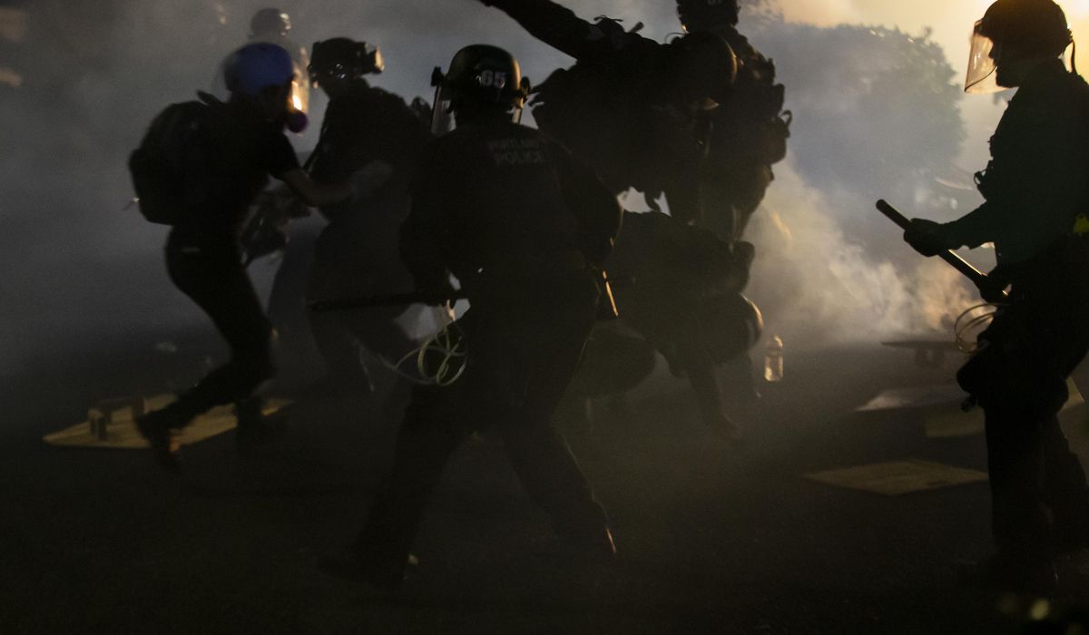 Police declare riot in Portland amid ongoing
protests 1