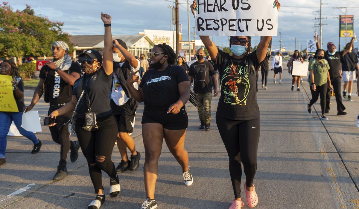 Peaceful protest urged in fatal police shooting of Black
man 1