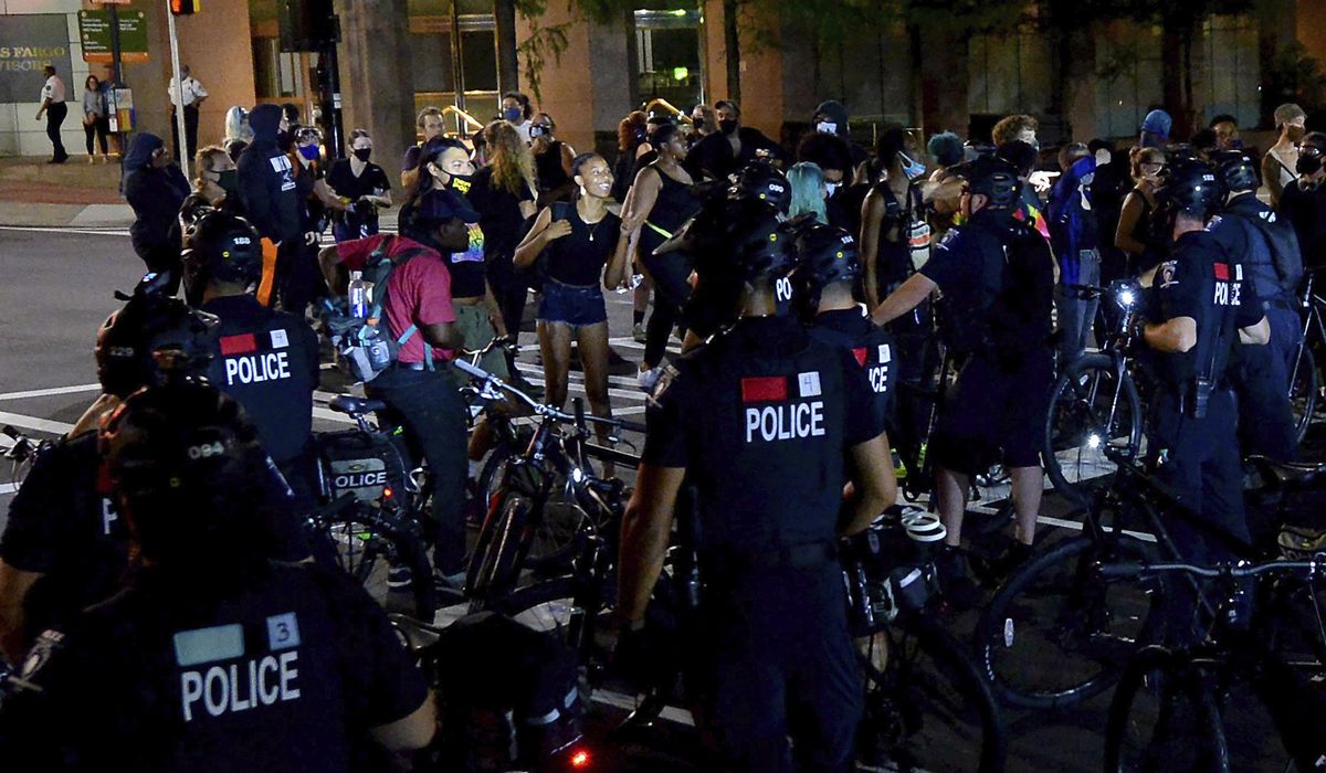 Police, protesters clash night before RNC opens in
Charlotte 1