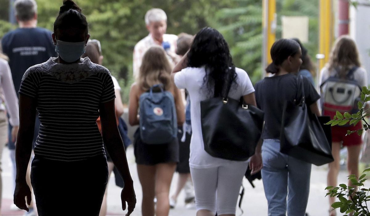 Virus cases reported at 41 schools in Germany's
capital 1