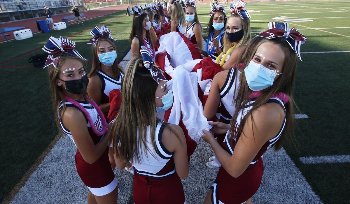 Utah high schools return to football, with virus
precautions 1