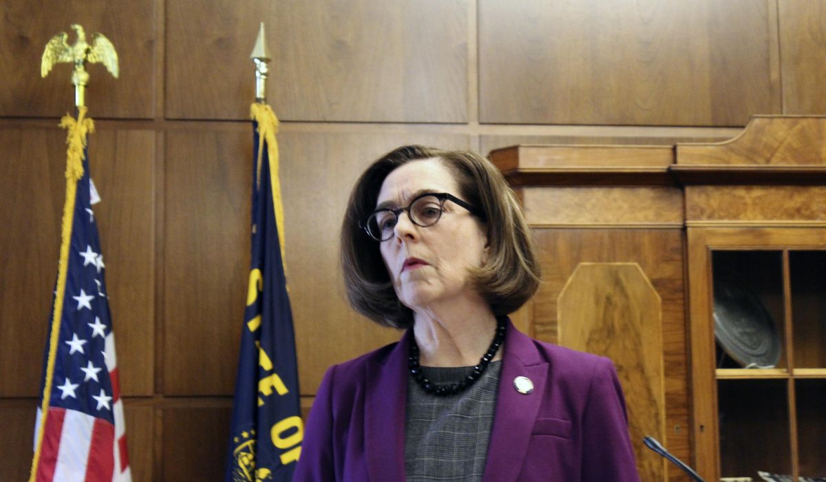 Kate Brown, Oregon governor, surges police to quell Portland
riots 1