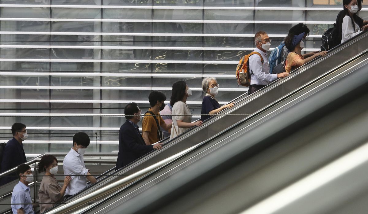 Asia Today: Many schools close again amid South Korea
spike 1