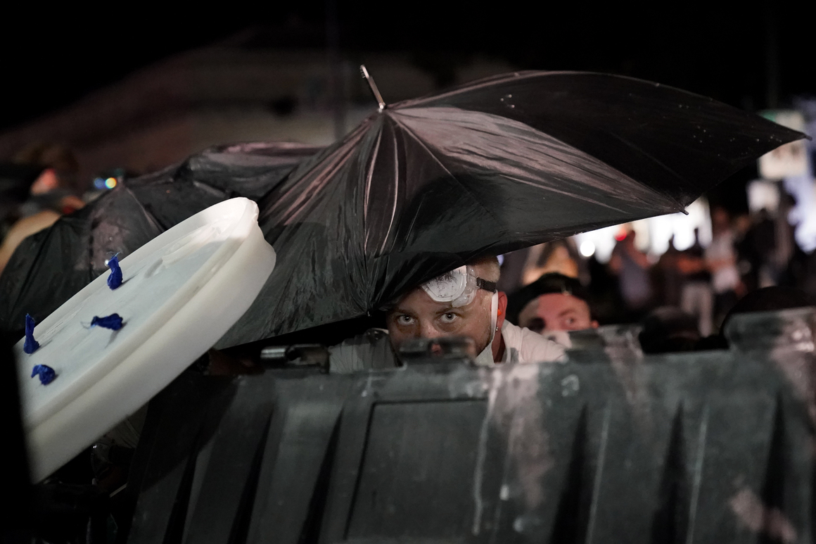 Lawyer says Blake paralyzed; protests erupt for third
night 1