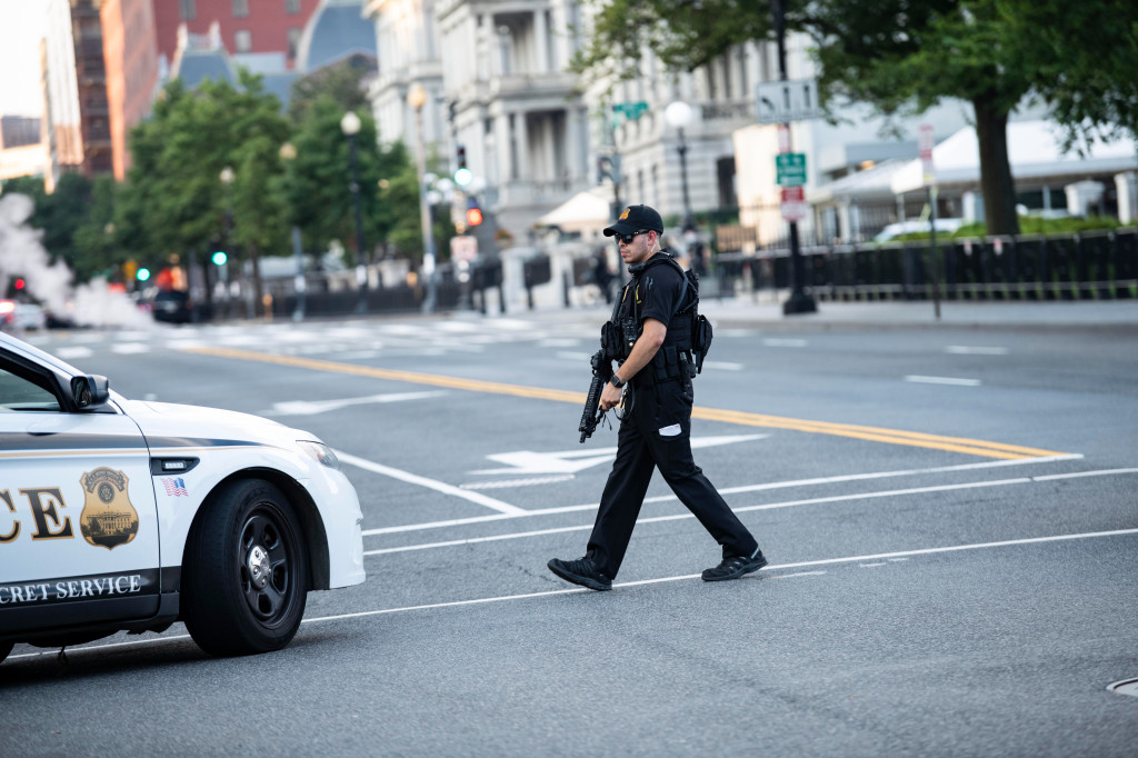 Man shot by Secret Service near White House charged with
assaulting an officer 1