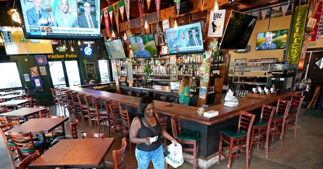 Iowa Gov. Kim Reynolds Closes Bars, Nightclubs in 6 Counties
over Coronavirus Spike Among the Young 1
