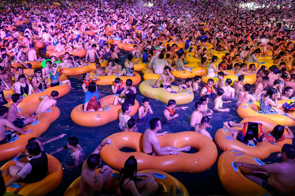 Shocking images show packed Wuhan pool party in former
coronavirus ground zero 1