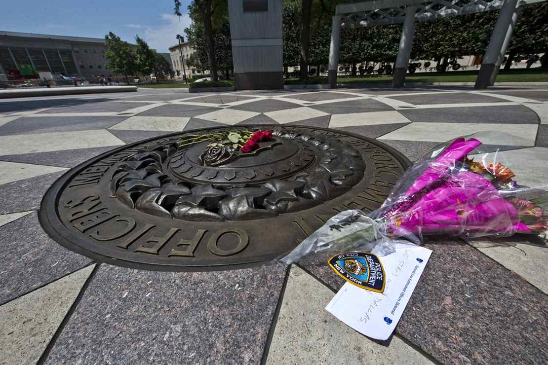 Open Season on Police as St. Louis Cop Killed and 2 Chicago
Officers Wounded 1